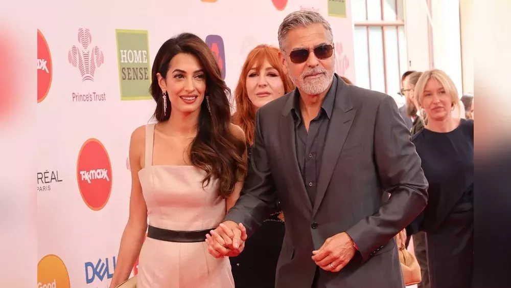 George und Amal Clooney händchenhaltend bei den Prince's Trust Awards