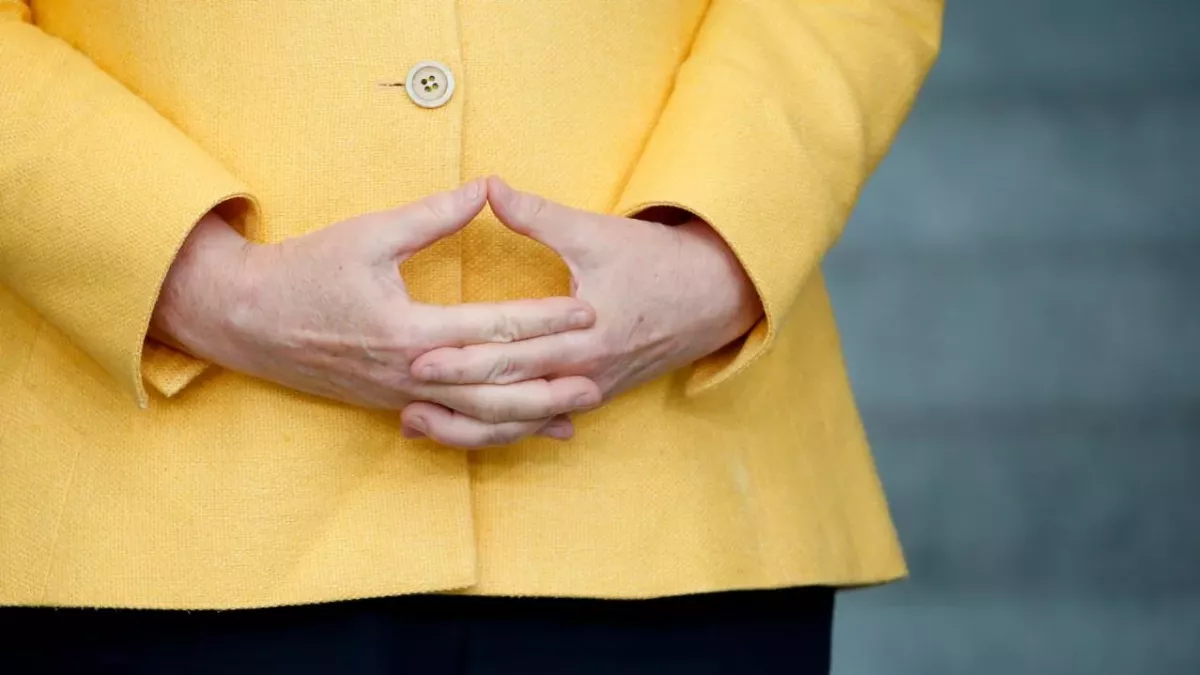 German Chancellor Angela Merkel poses for a picture during the G20 Compact with Africa (CwA) meeting in Berlin, Germany, August 27, 2021