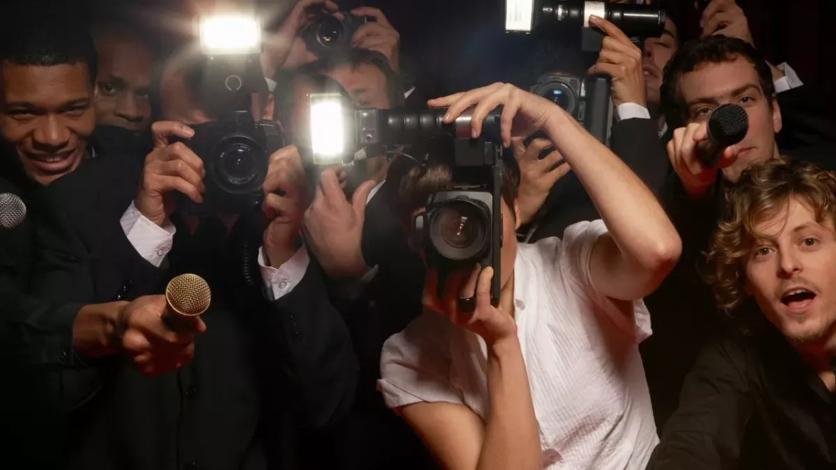 Paparazzi photographers and television reporters at celebrity event - Stock-Fotografie
