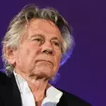 Roman Polanski posiert lächelnd mit seinem Missbrauchsopfer